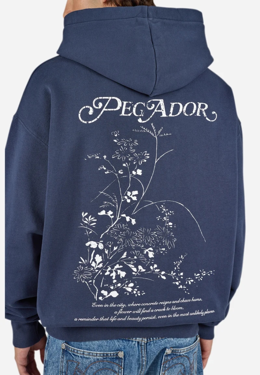 "Pegador Hoodie – Streetwear Comfort with a Bold Edge"